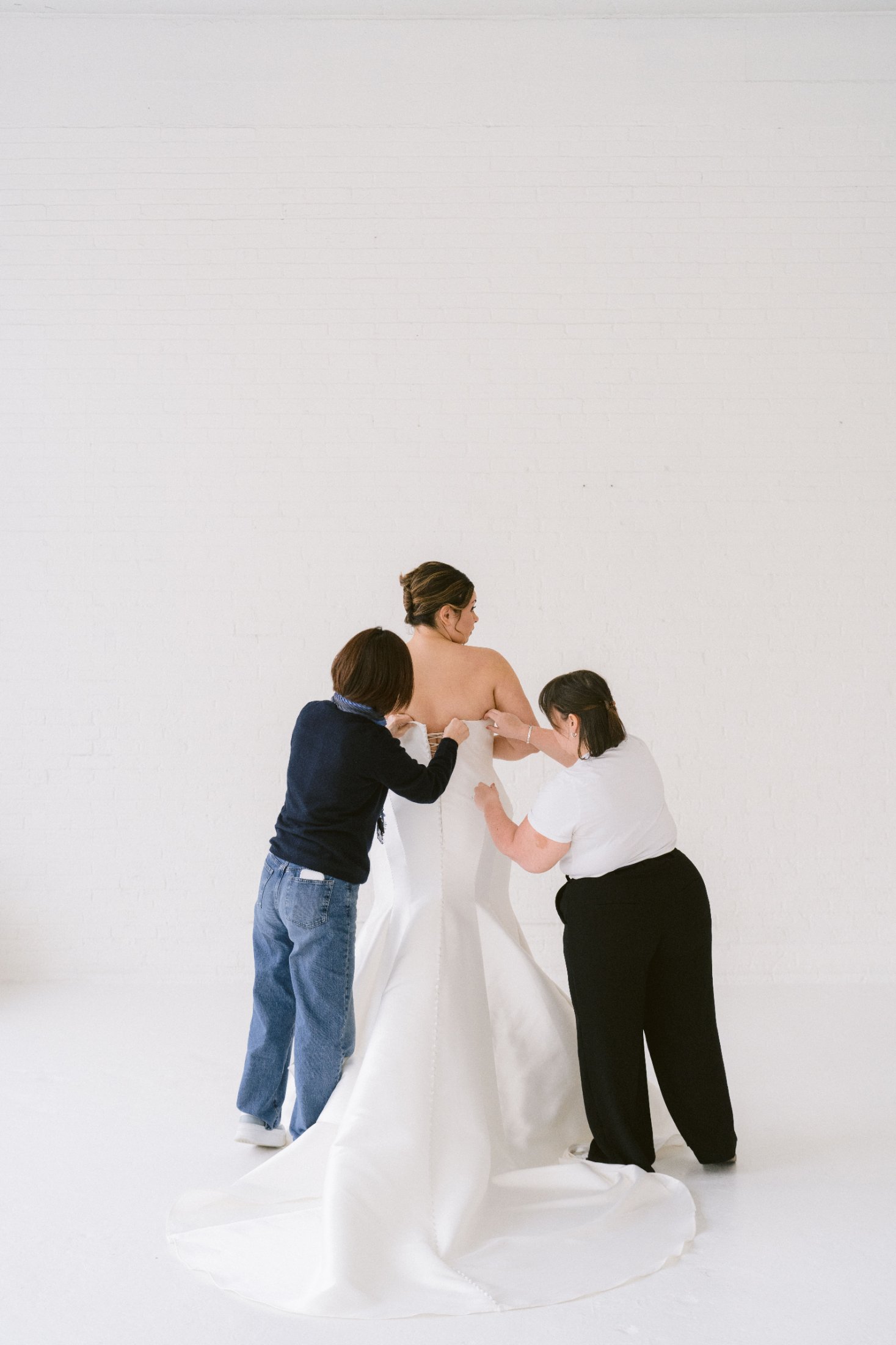 Curve Couture Bridal gown photographed in a bright atelier